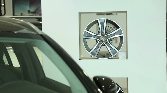 The front of the new black car. The windshield of the new car. View of row new car at new car showroom.
