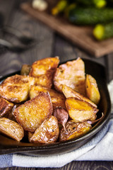 Baked potato wedges with garlic, christmas garnish