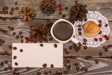 Cup of coffee, cookies, beans on wooden background. Template