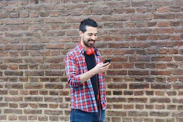 Young man using a smartphone.