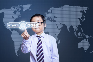 Child presses start button with 2017