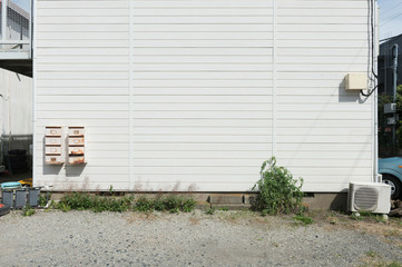 Large blank billboard on a street wall, banners with room to add your own text