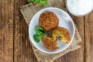 Wooden table with Falafels