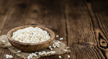 Old wooden table with puffed Rice