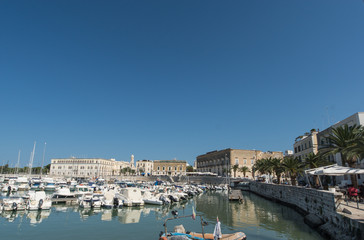 Fototapeta na wymiar Boats moored in port, Trani, Apulia, Italy.