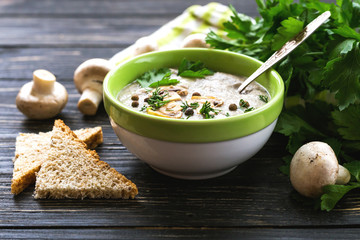 Mushroom puree soup with allspice, parsley, champignons and toas