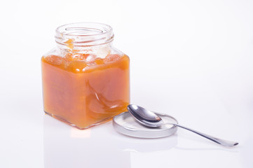 jar of jam homemade orange on white background