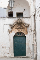 Fototapeta na wymiar Facade of a building located in Ostuni, also known as 