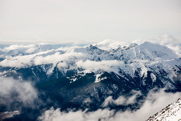 Fototapeta na wymiar mountain tops in winter covered in snow