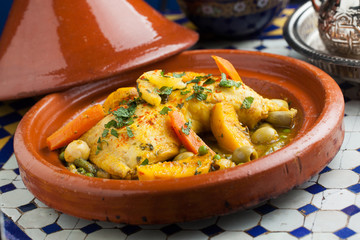 Morrocan food Tajine chicken vegetables lemon olives