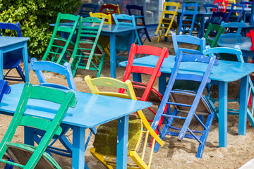 Fototapeta na wymiar Colorful chairs and table