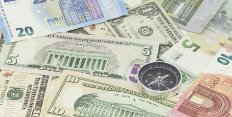 Compass on banknote for financial direction,concept of business