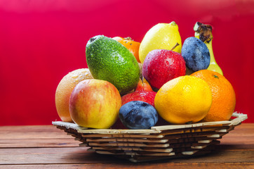 fresh fruit on a table in  basket