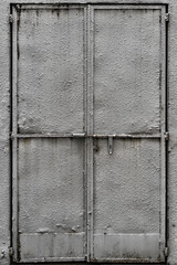 Fototapeta premium Plastered metal door, Penang, Malaysia