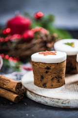 Traditional Christmas fruit rich cakes with decoration