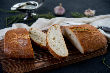 The Italian bread ciabatta with garlic and herbs
