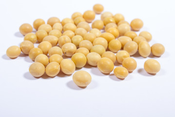 Soy beans on white background.