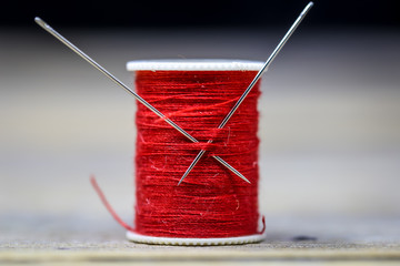 Sewing thread red needles