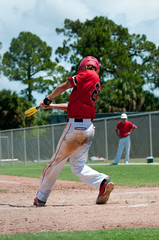 American baseball player swinging bat