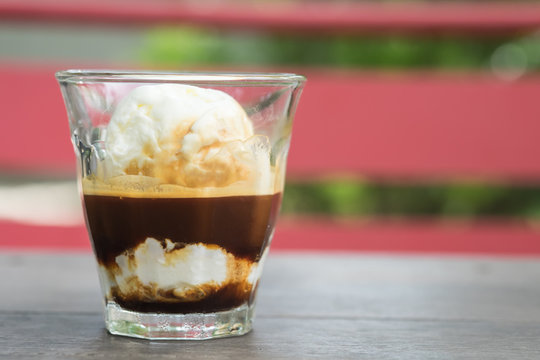 Affogato coffee, espresso shot with vanilla ice cream, backgroun