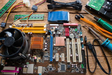 computer hardware repair on a wooden background