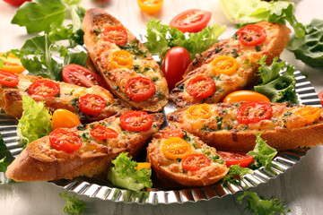 Fresh healthy vegetarian sandwiches with cheese and tomato