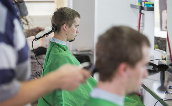 Male person having a haircut