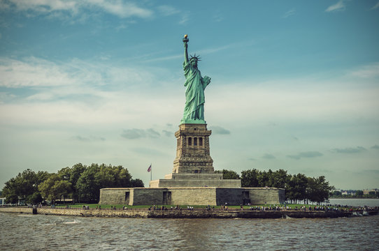Statue of Liberty on Liberty Island on a sunny day, New York City, USA, vintage filtered style