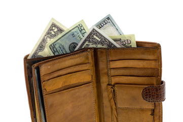 natural leather wallet isolated on white background. Expensive man's purse closeup. Wallet filled up with money