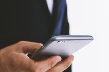 Business man with a smart phone