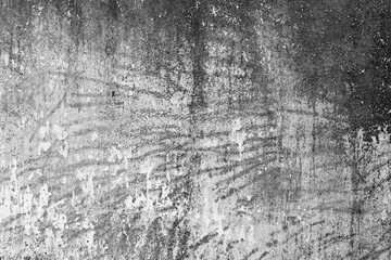 Wall fragment with scratches and cracks