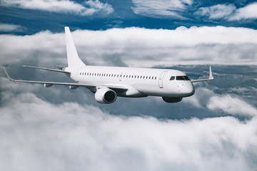 White airplane flying higher clouds at daytime
