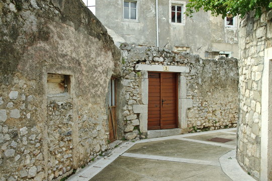 Fototapeta Senj, Croatia – September 18, 2016: a small town in northern Croatia, located on the Adriatic coast. Narrow street in the old town.