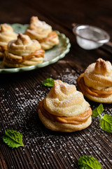 Delicious small cakes stuffed with caramel cream