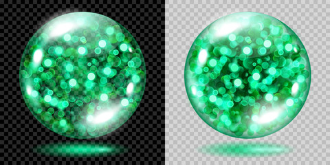 Two transparent spheres filled with green glowing sparkles with bokeh effect. Spheres with green sparkles, glares and shadows. For use on dark and light background. Transparency only in vector file