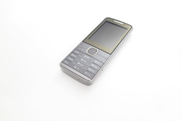 Classic mobile phone without logo isolated on white background