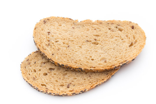 Sliced white bread with cereals. Isolated over white background.