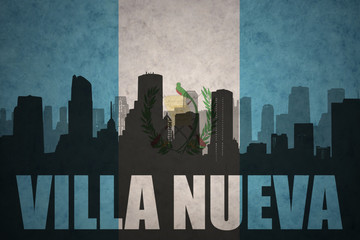 abstract silhouette of the city with text Villa Nueva at the vintage guatemalan flag