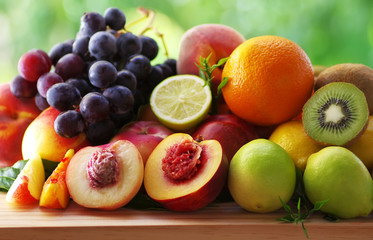 Naklejka na ściany i meble Assortment of juicy fruits on table