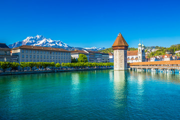 Historic center of Lucerne with chapel bridge, water tower and Pilatus mountain in background, Switzerland, Europe