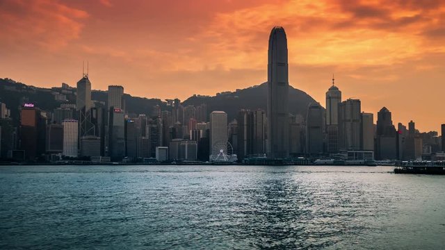 Hong Kong skyline in the morning over Victoria Harbour. 4K TimeLapse - August 2016, Hong Kong