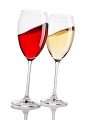 Glass of red and white wine in motion on white