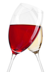 Glass of red and white wine in motion on white