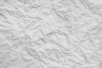 Texture of  crumpled bright paper. Closeup photo.