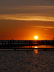 Fototapeta na wymiar Sunset over the Marina de Belem in Lisbon (Portugal)