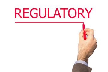 Hand writing regulatory with marker on transparent wipe board.