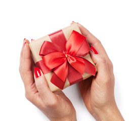 Female hands holding gift