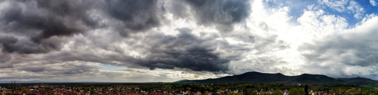 Panoramic view to the valley and stormy cloudy sky
