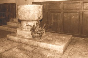 Font of The Blessed Virgin Mary in Emborough Somerset HDR sepia tone