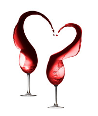 Red wine heart splash with two wineglasses isolated